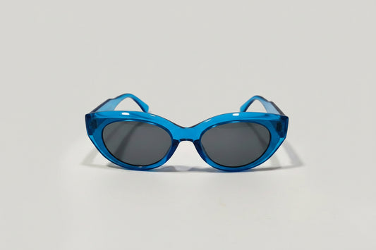 Kids Trendy Oval Sunglasses – Transparent Blue Frame with Grey Lenses